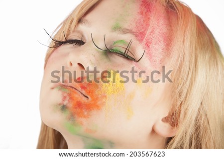 Creative Makeup. Outre Woman\'s Spotted Face and Stained Fingernails