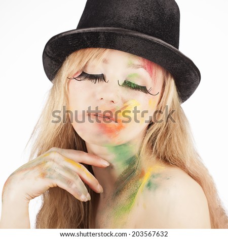 Creative Makeup. Outre Woman's Spotted Face and Stained Fingernails
