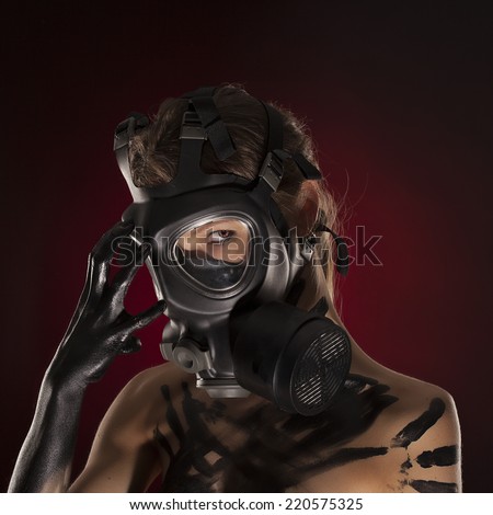 Sexy Woman wearing a Ammo Gas Mask, studio