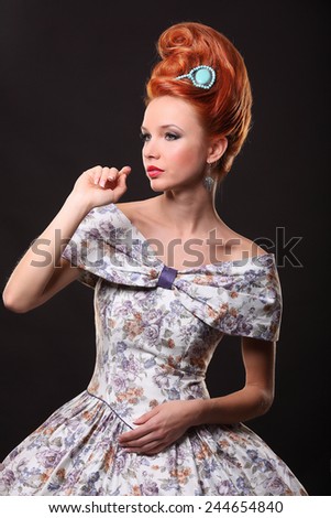 Luxury young beautiful woman in vintage victorian dress studio