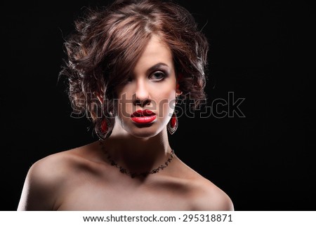 beautiful girl with a scar on face and shoulder studio