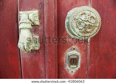 Old wooden door painted red