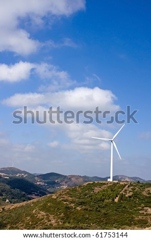 New and old windmill in the countryside