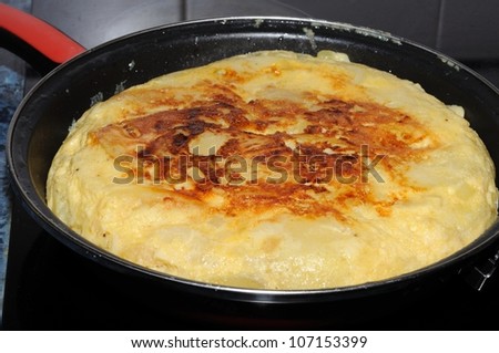 Homemade Spanish tortilla in a traditional tortilla pan, Andalusia, Spain, Western Europe.