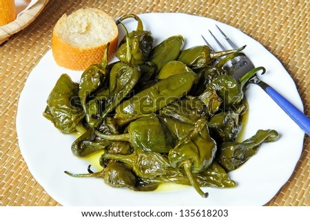 Padron peppers deep fried in olive oil tapas, Costa del Sol, Malaga Province, Andalucia, Spain, Western Europe.