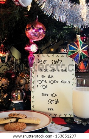 Dear Santa letter, milk and cookies under Christmas tree, Mijas Costa, Costa del Sol, Malaga Province, Andalucia, Spain, Western Europe.