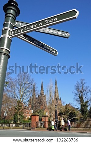 LICHFIELD, ENGLAND - MARCH 9, 2014 - Tourist information sign with Cathedral to the rear, Lichfield, Staffordshire, England, UK, Western Europe, March 9, 2014.