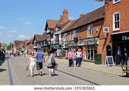 STRATFORD-UPON-AVON, UK - MAY 18, 2014 - Tourists along Henley Street, Stratford-Upon-Avon, Warwickshire, England, UK, Western Europe, May 18, 2014.