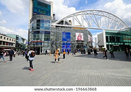 BIRMINGHAM, UK - MAY 14, 2014 - Shops along new street by the entrance to the Bullring shopping centre, Birmingham, West Midlands, England, UK, Western Europe, May 14, 2014.