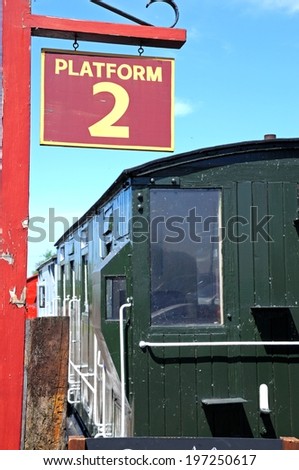 Platform 2 sign and railway wagon, Brownhills West Railway Station, Staffordshire, England, UK, Western Europe.