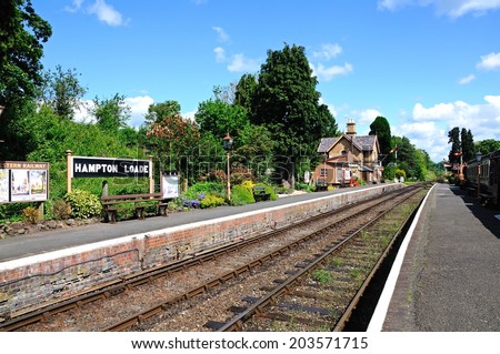 HAMPTON LOADE, UK - JUNE 5, 2014 - View along the railway tracks towards the Great Western railway station building and platform, Hampton Loade, Shropshire, England, UK, Western Europe, June 5, 2014.