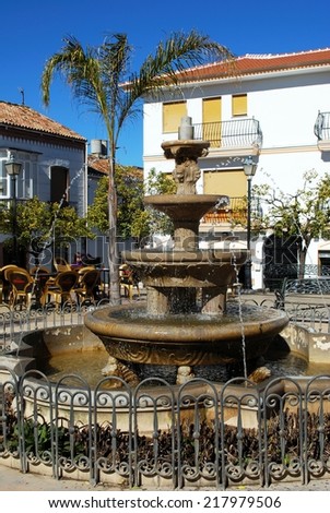 COLMENAR, SPAIN - FEBRUARY 13, 2009 - Fountain and pavement cafes in the town square, Colmenar, Andalusia, Spain, Western Europe, February 13, 2009.