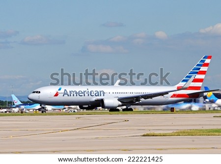 MANCHESTER, UNITED KINGDOM - JULY 22, 2014 - American Airlines Boeing 767-323ER taxiing at Manchester airport, Manchester, Greater Manchester, England, UK, Western Europe, July 22, 2014.