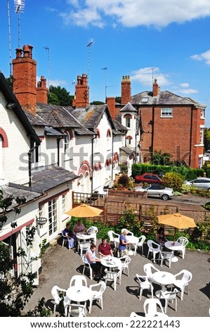 CHESTER, UNITED KINGDOM - JULY 22, 2014 - Elevated view of houses and cafes along the River Dee embankment, Chester, Cheshire, England, UK, Western Europe, July 22, 2014.