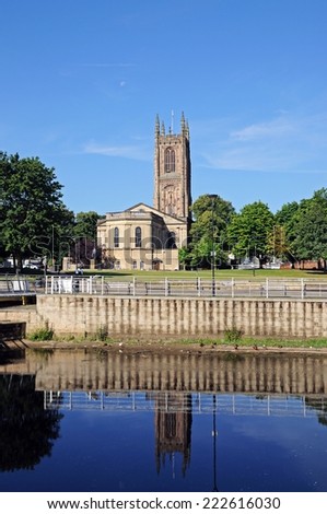 DERBY, UNITED KINGDOM - JULY 17, 2014 - The Cathedral of All Saints seen from across the River Derwent, Derby, Derbyshire, England, UK, Western Europe, July 17, 2014.