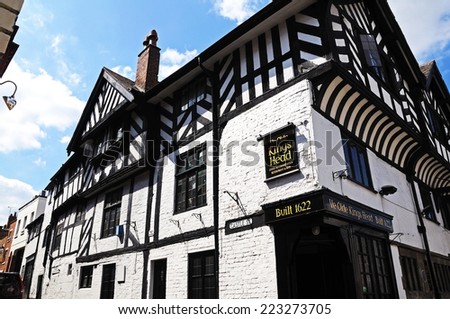 CHESTER, UNITED KINGDOM - JULY 22, 2014 - Kings Head Pub on the corner of Bridge Street and Castle street which was built in 1622, Chester, Cheshire, England, UK, Western Europe, July 22, 2014.