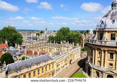 OXFORD, UK - JUNE 17, 2014 - Elevated view of Brasenose College with part of Radcliffe Camera on the right hand side seen from the University church of St Mary spire, Oxford, England, June 17, 2014.