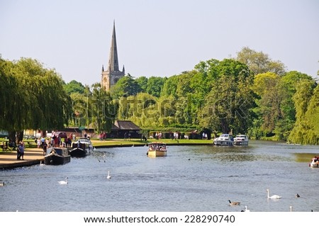 STRATFORD-UPON-AVON, UK - MAY 18, 2014 - View along the River Avon towards the Holy Trinity church, Stratford-Upon-Avon, Warwickshire, England, UK, Western Europe, May 18, 2014.