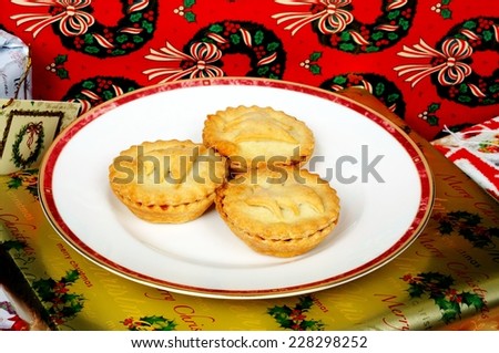 Homemade mince pies and wrapped Christmas presents, England, UK, Western Europe.