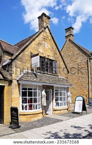 BROADWAY, UK - JUNE 12, 2014 - Cookshop along the High Street in the centre of the village, Broadway, Cotswolds, Worcestershire, England, UK, Western Europe, June 12, 2014.