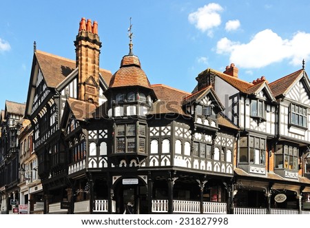 CHESTER, UNITED KINGDOM - JULY 22, 2014 - The rows shops on the corner of Eastgate Street and Bridge Street, Chester, Cheshire, England, UK, Western Europe, July 22, 2014.