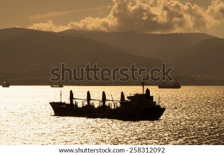 Freighter ship at anchor in Algecrias Bay with the Spanish coastline to the rear seen from The Rock, Gibraltar, United Kingdom, Western Europe.