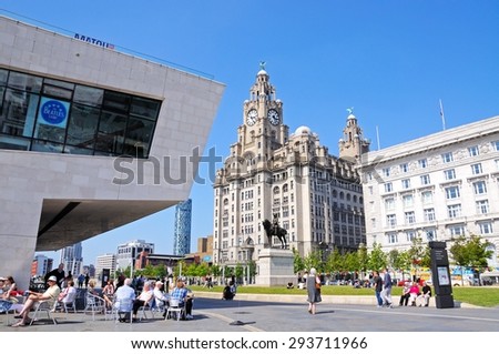 LIVERPOOL, UNITED KINGDOM - JUNE 11, 2015 - View of the Liver Building and Cunard Building with a pavement cafe in the foreground, Liverpool, Merseyside, England, UK, Western Europe, June 11, 2015.