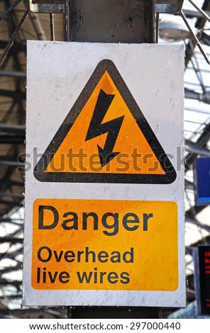 Danger overhead live wires sign inside Lime Street Railway Station, Liverpool, Merseyside, England, UK, Western Europe.