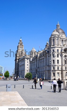 LIVERPOOL, UNITED KINGDOM - JUNE 11, 2015 - The Three Graces consisting of the Liver Building, Port of Liverpool Building and the Cunard Building, Liverpool, Merseyside, England, UK,June 11, 2015.