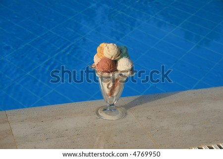 Ice-cream on a background of pool.