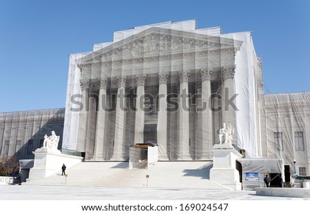 WASHINGTON - FEBRUARY 21: A large covering protects the United States Supreme Court during renovations on February 21, 2013. The United States Supreme Court is the highest court in the United States.