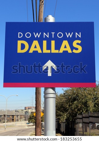 A sign marking the way to Downtown Dallas, Texas.