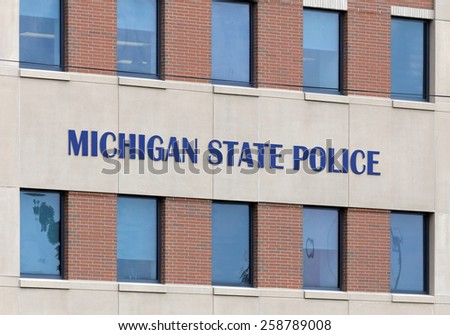 LANSING, MI - AUGUST 1: The Michigan State Police Headquarters building in Lansing, Michigan on August 1, 2014. The Michigan State Police is the state police agency for the state of Michigan.