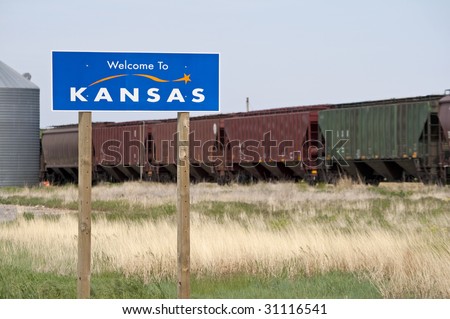 A welcome sign at the Kansas state line