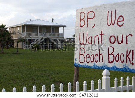 GRAND ISLE, LA - JUNE 5: A sign on the front lawn of a home on June 5, 2010 in Grand Isle, LA. The BP oil spill that began April 20th, 2010, has resulted in oil washing up on the shores of Louisiana.
