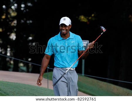JOHNS CREEK, GEORGIA, USA - AUG 10: Tiger Woods walking on the course during practice rounds at the 2011 PGA Championship tournament in Jonhs Creek, Georgia on August 10, 2011.