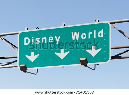 ORLANDO - DECEMBER 22: A sign in Orlando, FL points to the Walt Disney World Resort on December 22, 2011. With more than 47 million visitors in 2010, it is world\'s most visited entertainment resort.