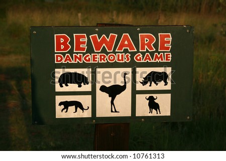 Beware of the dangerous animals sign in the safari camp