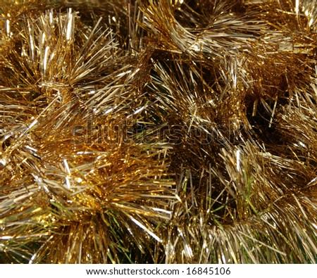 Strings of Gold Tinsel in a heap