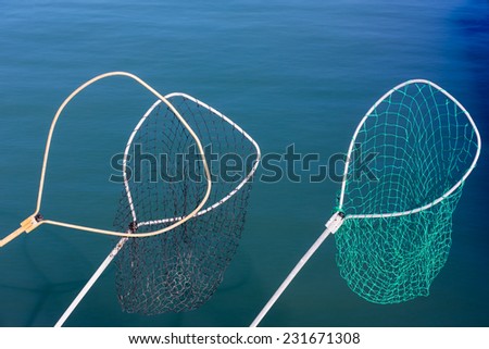 Fishing Nets Against Ocean Water Background