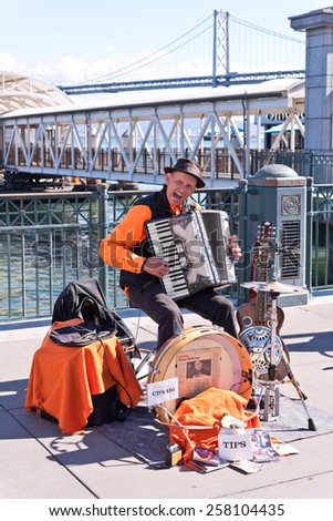 February 28, 2015 -One man band performs at the waterfront Embarcadero in San Francisco, CA.