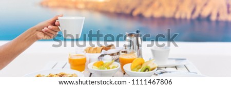 Cruise vacation breakfast woman drinking coffee at restaurant. Banner panorama of morning person eating holding coffee cup at luxury resort hotel.