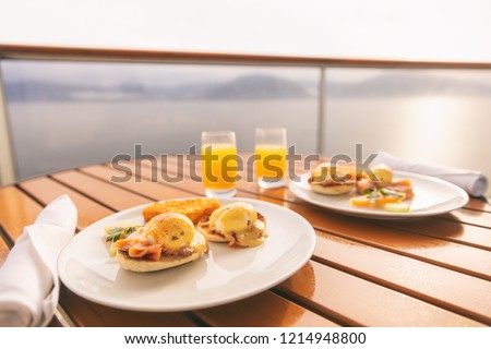 Cruise ship vacation food breakfast on suite balcony table in room service. Caribbean travel getaway, winter escape or honeymoon cruise in Europe or Santorini.