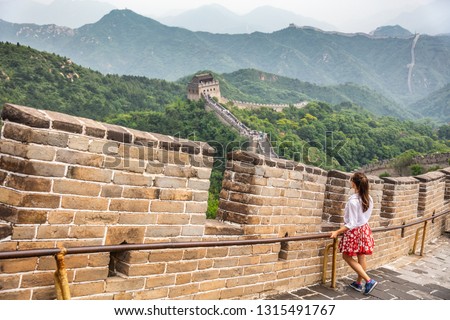 Travel tourist in Great Wall of China, Beijing tourist attraction chinese destination. Asian woman traveling in Asia vacation world tour.