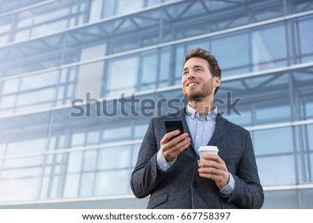 Business man holding phone drinking coffee at bank office thinking of the future. Aspirational businessman dreaming of career hope.