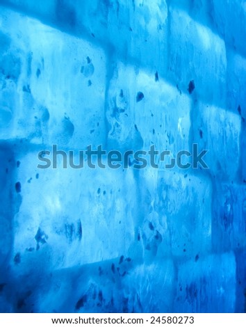 Wall of ice bricks with blue back light