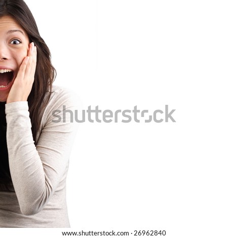 stock photo Very surprised eurasian woman holding her head in amazement