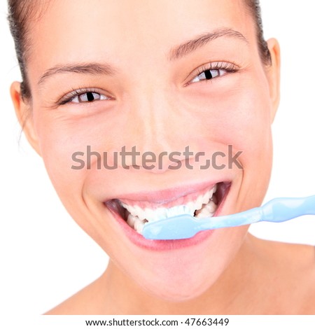 Brushing Teeth Closeup Of Woman Brushing Her Teeth With Toothpaste And A Manual Toothbrush