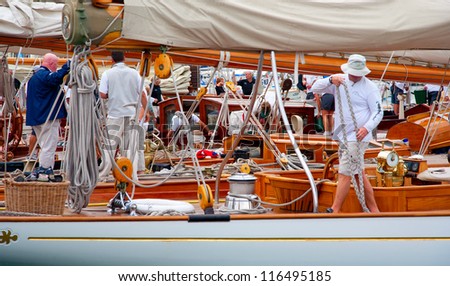 CANNES, FRANCE - SEPTEMBER 28, 2012: Unidentified crew members in the harbor after the 34th edition of the Regates Royales - Panerai Trophy 2012 on September 28 , 2012 in Cannes