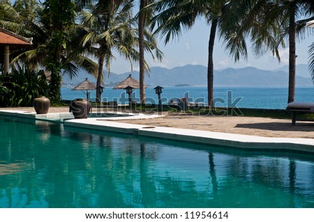 Idlyllic pool at South East asian resort